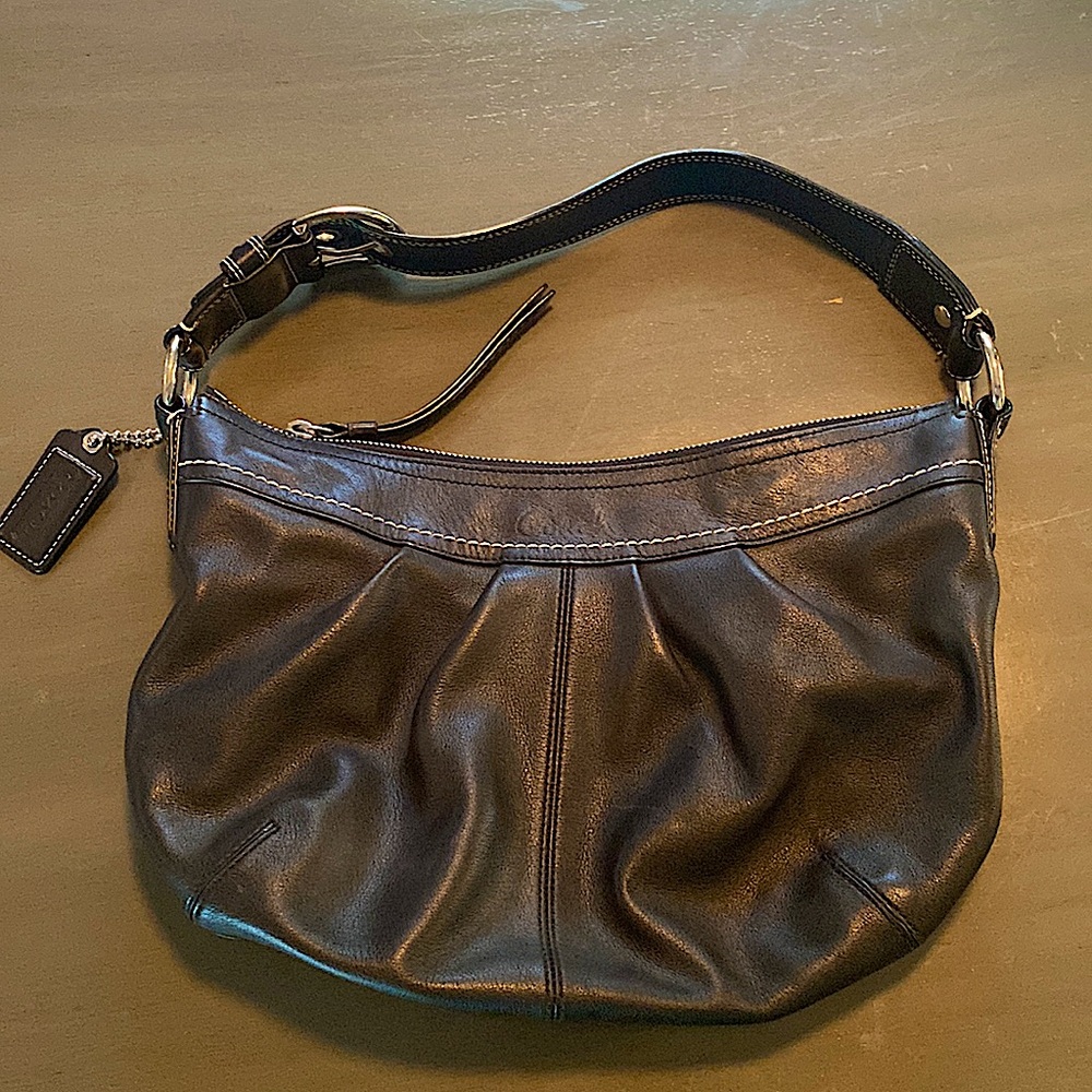 Authentic beautiful black leather coach handbag.